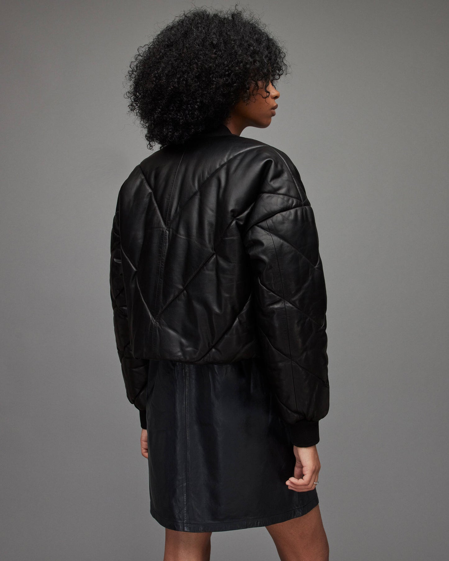 Women's Black Puffer Leather Jacket - Sleek and Warm